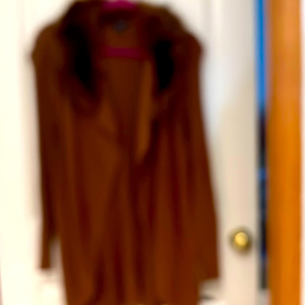 Sweater with faux collar. Open without button closures.